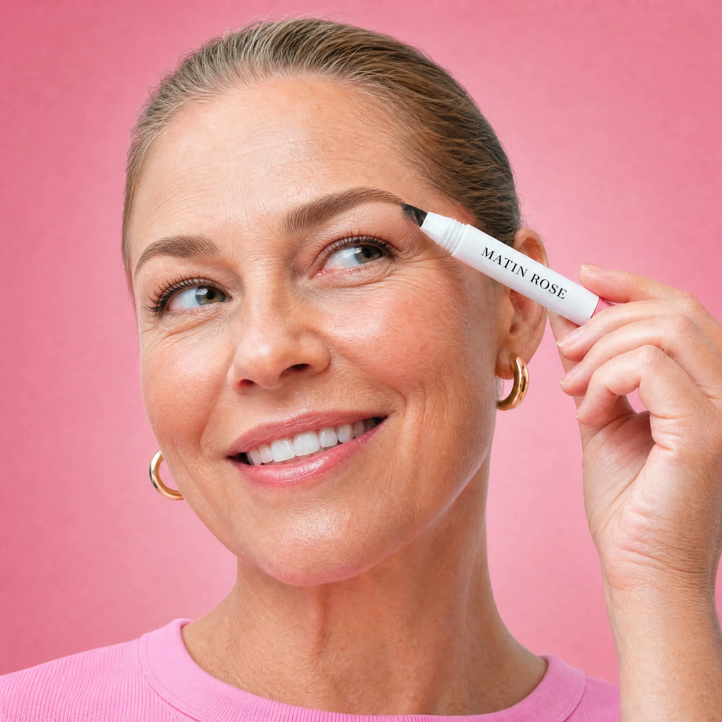 Woman applying MagicBrow brow brush